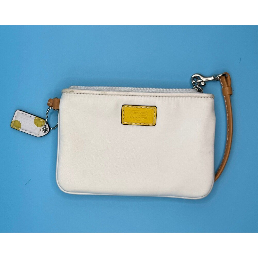 Coach White Wristlet Clutch with Yellow Tag and Tan Strap